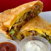 Breakfast Burrito · Scrambled eggs mixed with hash brown, bacon or sausage or chorizo or gyro or house pastrami,...