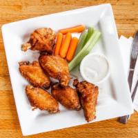 Oasis Wings · Jumbo, all-natural wings, deep-fried just right and served with your choice of sauce: golden...
