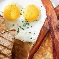 925 Breakfast · two eggs any style, choice of meat, served with toast and hashbrowns
