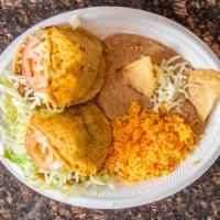 Gordita Dinner · Two pieces. Includes rice and beans.