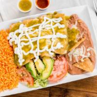 Enchiladas · Rolled tortillas stuffed with chicken and cheese. Served with rice, beans.