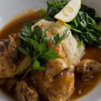 Chicken Marsala · Lightly floured and sautéed with mushrooms, onions and marsala sauce. Served with garlic mas...