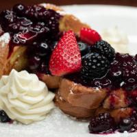 Cheesecake French Toast · creamy new york cheesecake stuffed between slices of vanillabattered french toast, topped wi...