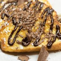 French Silk French Toast · 4 slices of vanilla-battered french toast with french silk drizzle, shaved milk chocolate an...