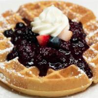 Triple Berry Waffle · belgian waffle topped with triple berry compote, fresh berries and whipped cream, dusted wit...