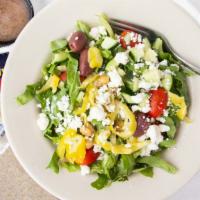 Greek Salad · Lettuce, cucumbers, red onions, tomatoes, chickpeas, kalamata olives. Pepperoncini and feta ...