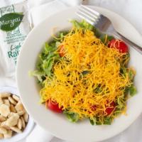 Garden Salad · Lettuce, cucumbers, red onions, tomatoes, croutons and shredded cheddar cheese. Add your cho...