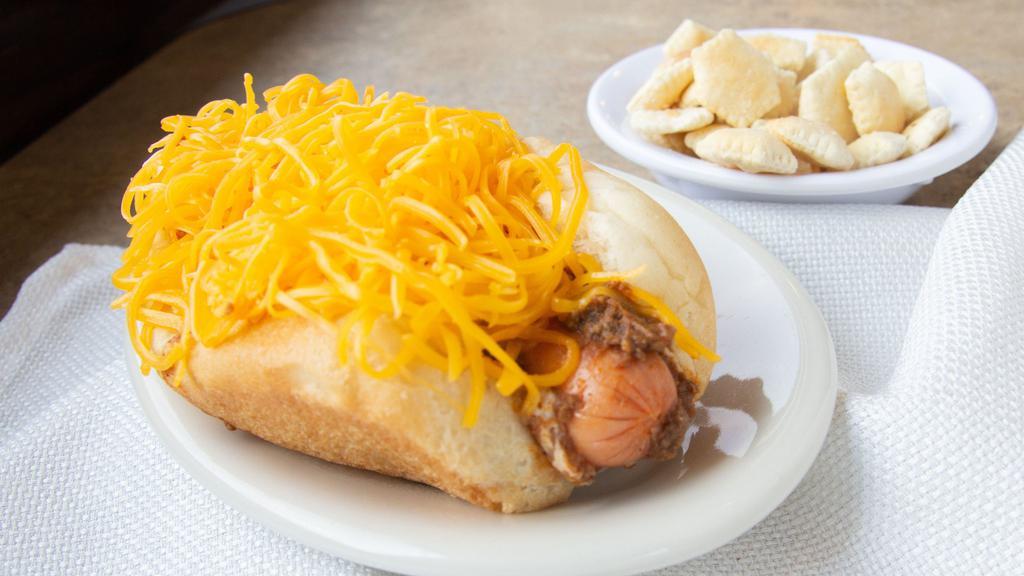 Cheese Coney · Skyline's classic Cheese Coney is a specially-made hot dog in a steamed bun, with mustard, covered with our original, secret-recipe chili, diced onions and a mound of shredded cheddar cheese.