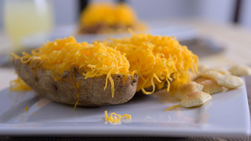 Cheddar Potato · Topped with margarine and shredded cheddar cheese.