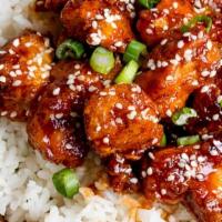 Sesame Chicken · Large. chicken in a sweet sauce served with sesame seeds.