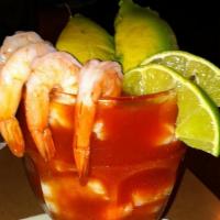 Shrimp Cocktail · Succulent shrimp, simmered in our own home-made cocktail sauce and topped with tomatoes, oni...