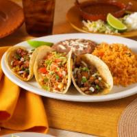 2 Taco Dinner · Served with rice and beans. Choice of  pork, beef, chicken, sausage, avocado
