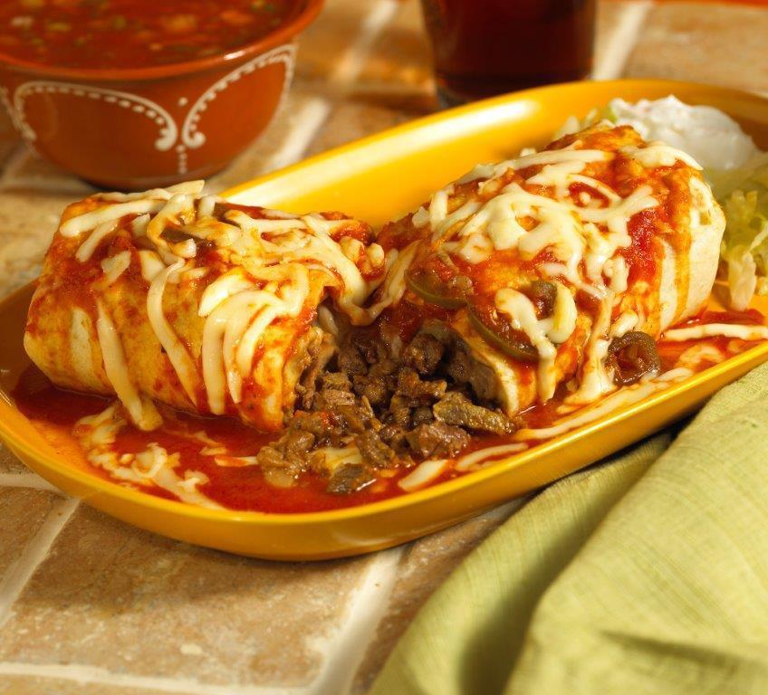 Suizo Burrito · Choice of meat or vegetarian style topped with melted cheese and ranchero sauce.