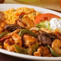 Shrimp Fajitas · Grilled jumbo shrimp sauteed with onions, tomatoes, bell peppers and red peppers.