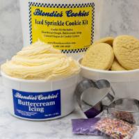 Cookie Kit · A bucket that contains 2 lbs. of sprinkle dough, 1.5 lbs. of buttercream icing, a cookie cut...