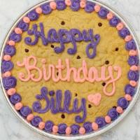 16” Cookie Cake · A 16” round cookie cake with a buttercream icing border and writing of your choice with a ma...