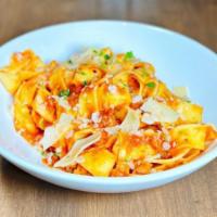 Pappardelle Bolognese · our famous 8hr ragu of tomato, pork, veal, parmesan, parsley