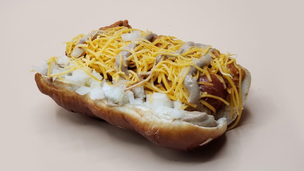 Chili Cheese Dawg · Premium all-beef frank, chunky beef chili, diced sweet onion, shredded cheddar, stadium mustard, celery salt, served on a steamed pretzel roll. Substitute Italian sausage or plant-based Beyond Brat for an additional charge. Substitute a poppy seed bun on request.