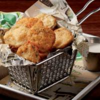 Crispy Fried Pickles · 490 cal. pickles coated in panko bread crumbs, fried & served with creamy ranch dressing.