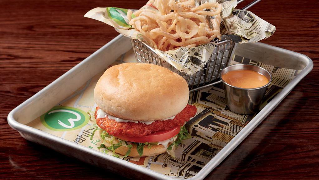 Buffalo Chicken Sandwich · 760 cal. breaded chicken tossed in buffalo sauce & topped with blue cheese sauce, tomato & lettuce.
