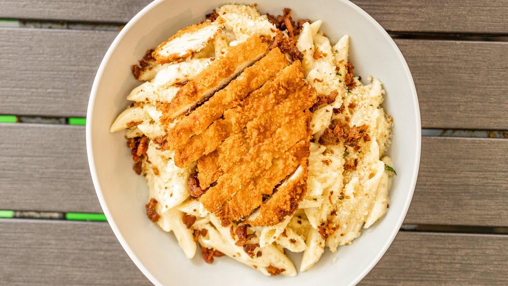 Smoked Bacon Mac 'N' Cheese · 920 cal. mini penne, smoked bacon, government cheese, cheddar & smoked mozzarella topped with housemade garlic Parmesan panko bread crumbs. Add Chicken for an additional charge. available without bacon.