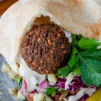 Falafel Pita Pocket · Contains gluten. Hummus, Romaine lettuce, Jerusalem salad, cabbage slaw, house pickled veggi...