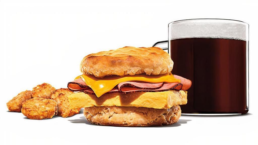 Ham, Egg & Cheese Biscuit Meal · Black Forest ham, fluffy eggs, and melted American cheese on a warm buttermilk biscuit. Served with Hash Browns and your choice of Drink.