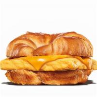 Egg & Cheese Croissan'Wich · Fluffy eggs and melted American cheese on a toasted croissant.
