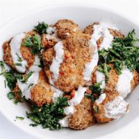 Spicy Cauliflower · Vegan, Gluten-Free, Contains Nuts. Cauliflower florets lightly fried, topped with Tahini Lem...