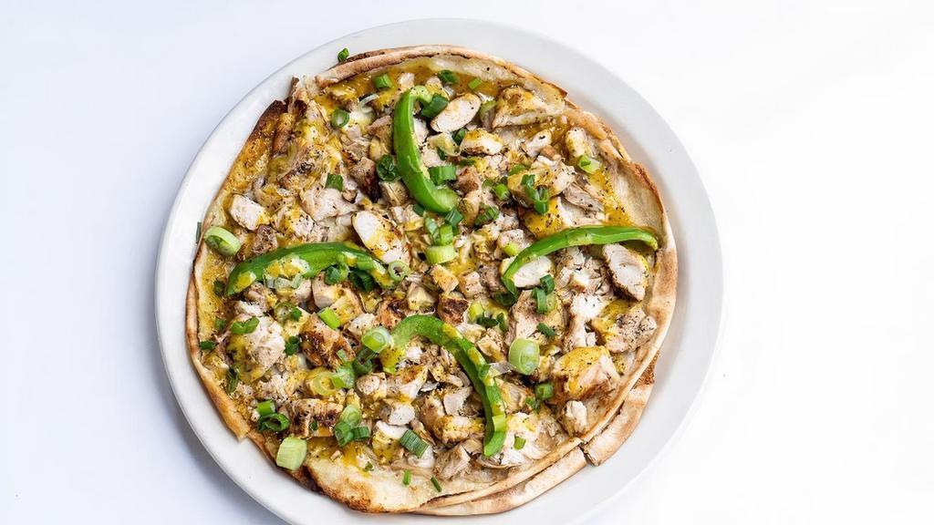 Aladdin'S Chicken Pitza · Honey Dijon dressing and our homemade Garlic Sauce topped with chopped grilled chicken tenders, green peppers, and diced scallions