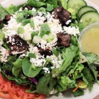 Shish Kabob Salad · Gluten-Free. Grilled beef tenderloin over mixed greens, sliced tomatoes and cucumbers, calam...