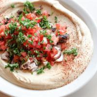 Hummus Chicken Plate · Gluten-Free. Our award-winning Hummus topped with chopped grilled chicken, diced tomatoes, a...