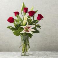 Debi  Lilly Fragrant Rose Arrangement · Custom designed  Roses and Fragrant lilies in a vase