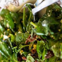 Spinach Salad · Gorgonzola, pine nuts, red onions, sun-dried tomatoes, and raspberry Champagne vinaigrette. ...