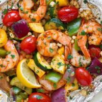 Shrimp Magnifico · Shrimp sauteed with extra virgin olive oil, garlic, baby spinach, asparagus, yellow squash, ...