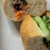 Heo · Banh Mi Heo Nuong. Grilled Pork Sandwich. Grilled marinated pork chop strips, mayo, jalapeno...