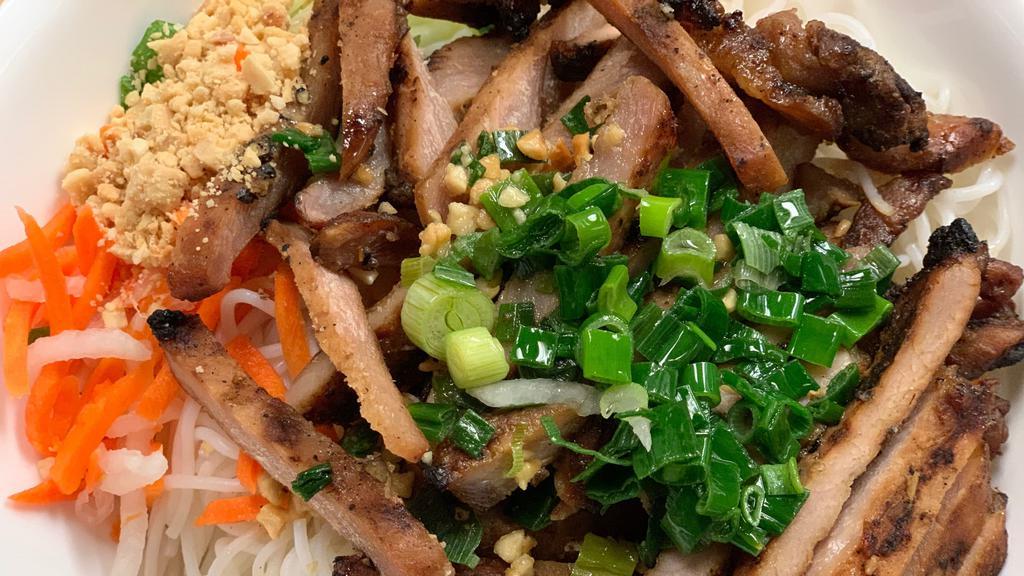 #302. Bhn · Bun Thit Heo Nuong. Grilled Pork Chop Vermicelli Salad. Grilled marinated pork chop slices, vermicelli noodles, lettuce, cucumber, mint, cilantro, pickled carrots, crushed peanuts and fish sauce dressing.