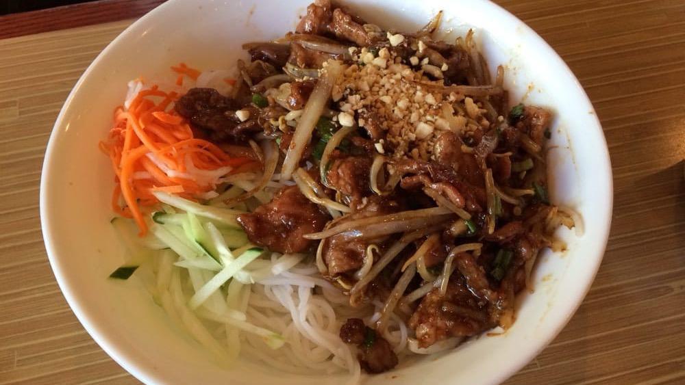 #305. Bbx · Bun Bo Xao. Stir Fried Beef Vermicelli Salad. Gluten-Free. Spicy. Stir fried beef with onions and sprouts.