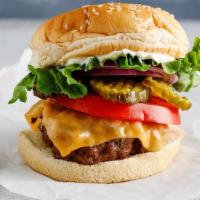 Cheeseburger · Premium Halal Beef Patty, American Cheese, Lettuce, Tomato, Pickles, Onion