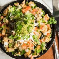Taco Salad · A bed of lettuce, topped with choice of protein, rice, beans, or fajitas, toppings and salsa...