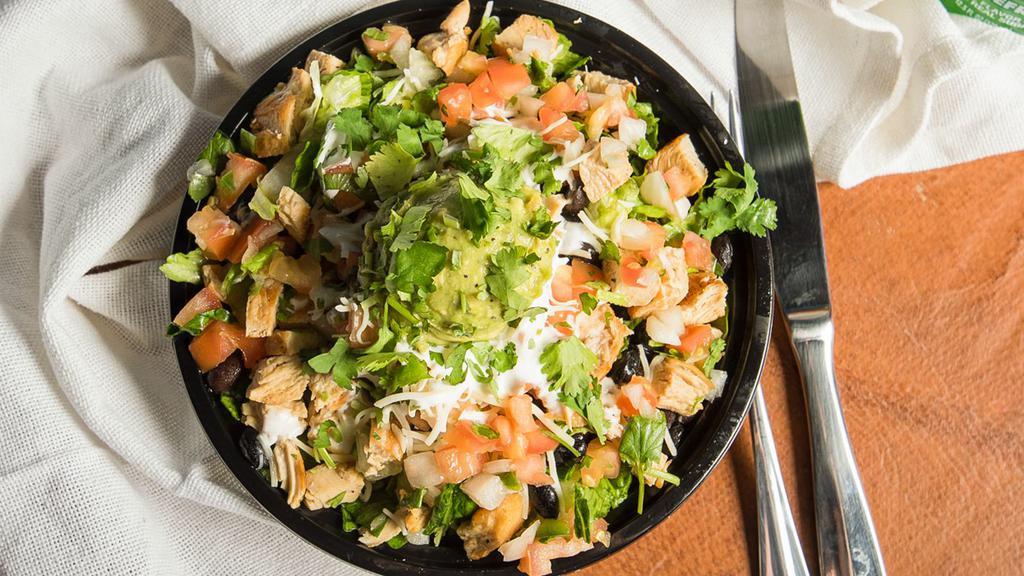 Taco Salad · A bed of lettuce, topped with choice of protein, rice, beans, or fajitas, toppings and salsa (No Shell)