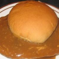 Wet Tenderloin® · Our famous hand-breaded tenderloin smothered in our special gravy. You gotta try it!