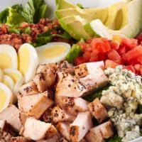 Cobb Salad  · romaine, grilled chicken, bacon, hard-boiled egg slices, tomatoes, avocado slices, bleu chee...