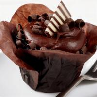 Chocolate Addiction Cupcake Filled With Chocolate Mousse Filling · Milk chocolate batter topped with dark chocolate icing. Garnished with curls of chocolate. S...