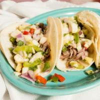 Plaza Street Tacos · Shredded green chile pork, chorizo or shredded beef in small corn tortillas. Topped with you...