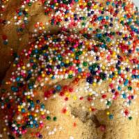 Sprinkle Cookie · A perfectly fluffy cookie topped with rainbow non pareils.