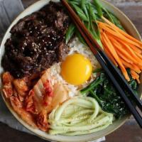 Bibimbap · Assorted veggies on rice topped with fried egg. Mix it up with our homemade gochujang sauce....