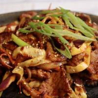 Doeji Bulgogi · Pork and veggies stir-fried in spicy gochujang sauce. Served with rice.