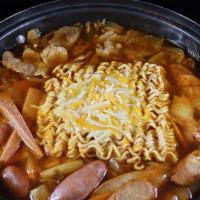 Army Base Stew / Budae Jjigae · A Korean/American fusion dish with sausage, spam, veggies, tofu, kimchi, and hot dog in a ri...