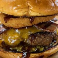 Bacon Burger · House-made steak burger with Cheddar cheese, onion rings, roasted jalapeño, grilled bacon, a...
